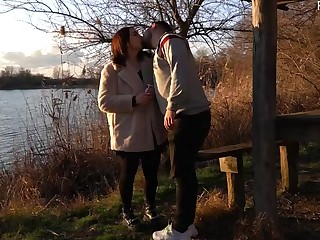 Public blowjob increased by pegging near the lake